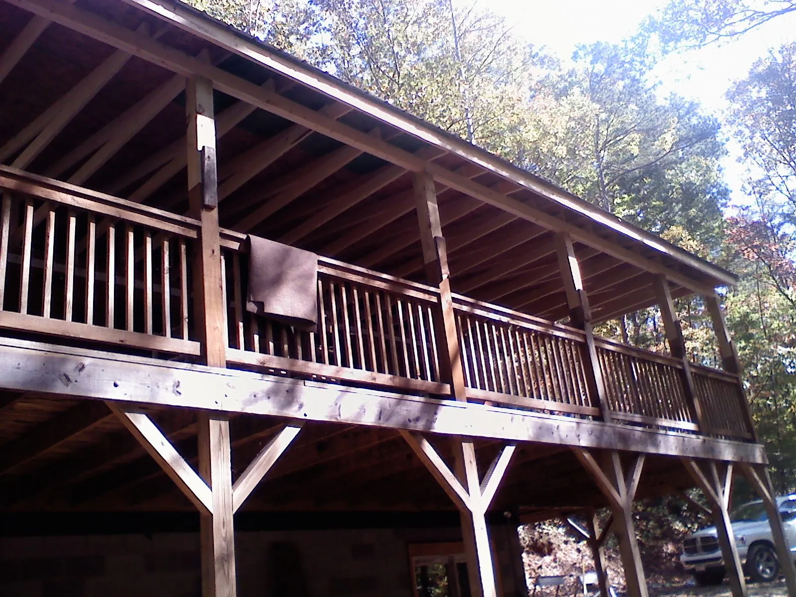 Timber framing under a new elevated porch and deck — Roof Leak Repair in Dowagiac by Roofing Brothers